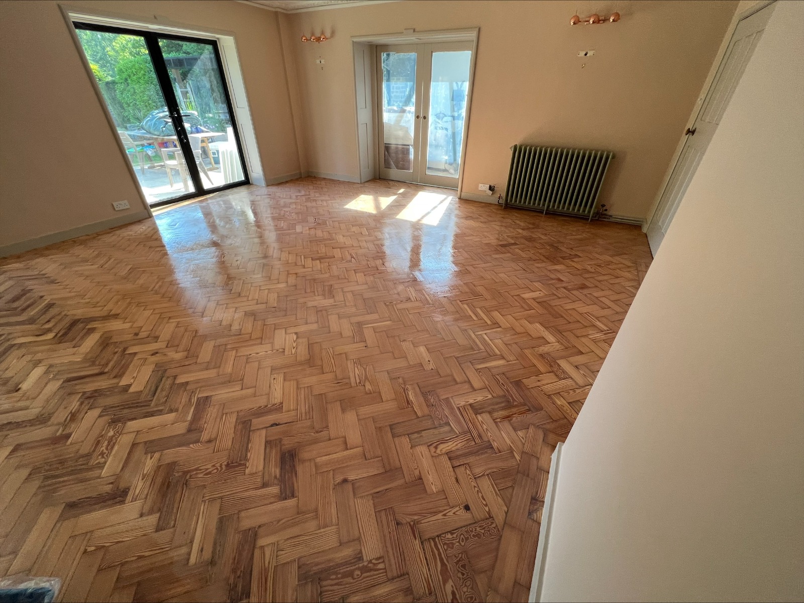Floor Sanding Preparation Checklist completed on a fully restored oak herringbone parquet living room floor after sanding and refinishing.